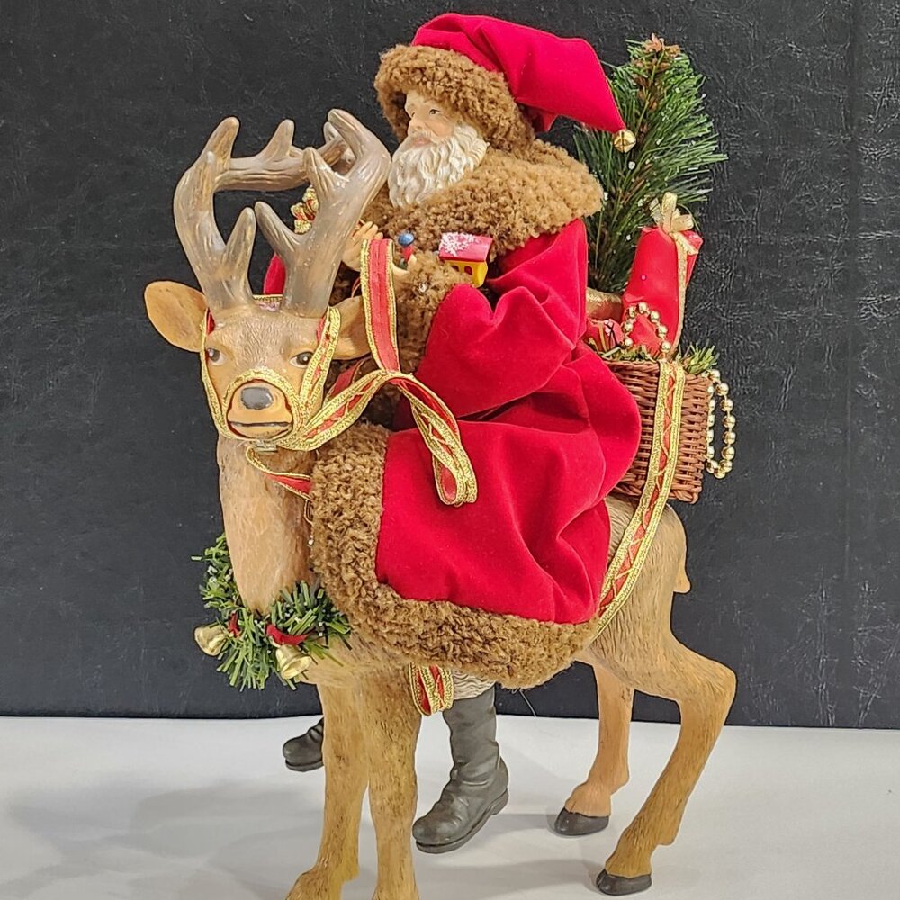 13.5" Fabriche Santa on Reindeer Figurine